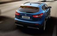 Blue Qashqai driving away