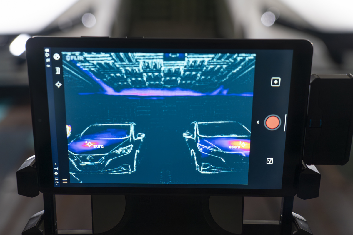 Tablet showing heat immersing from two cars